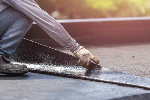 Professional Basement Waterproofing technician working in Keego Harbor, MI